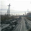На окраине Красноярска неизвестные вылили на дорогу жидкую золу